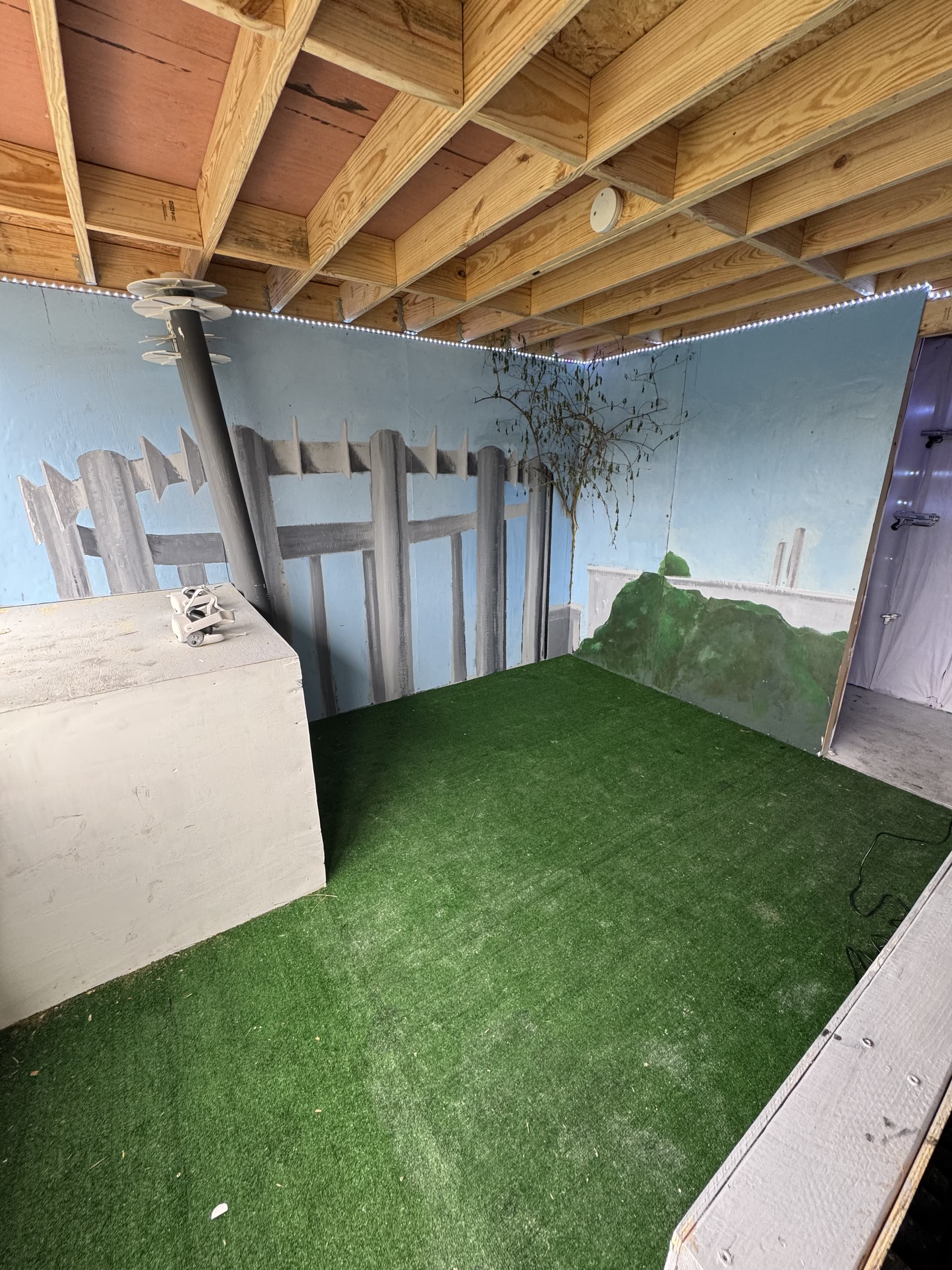 Physical booth room setup for the mixed-reality experience.